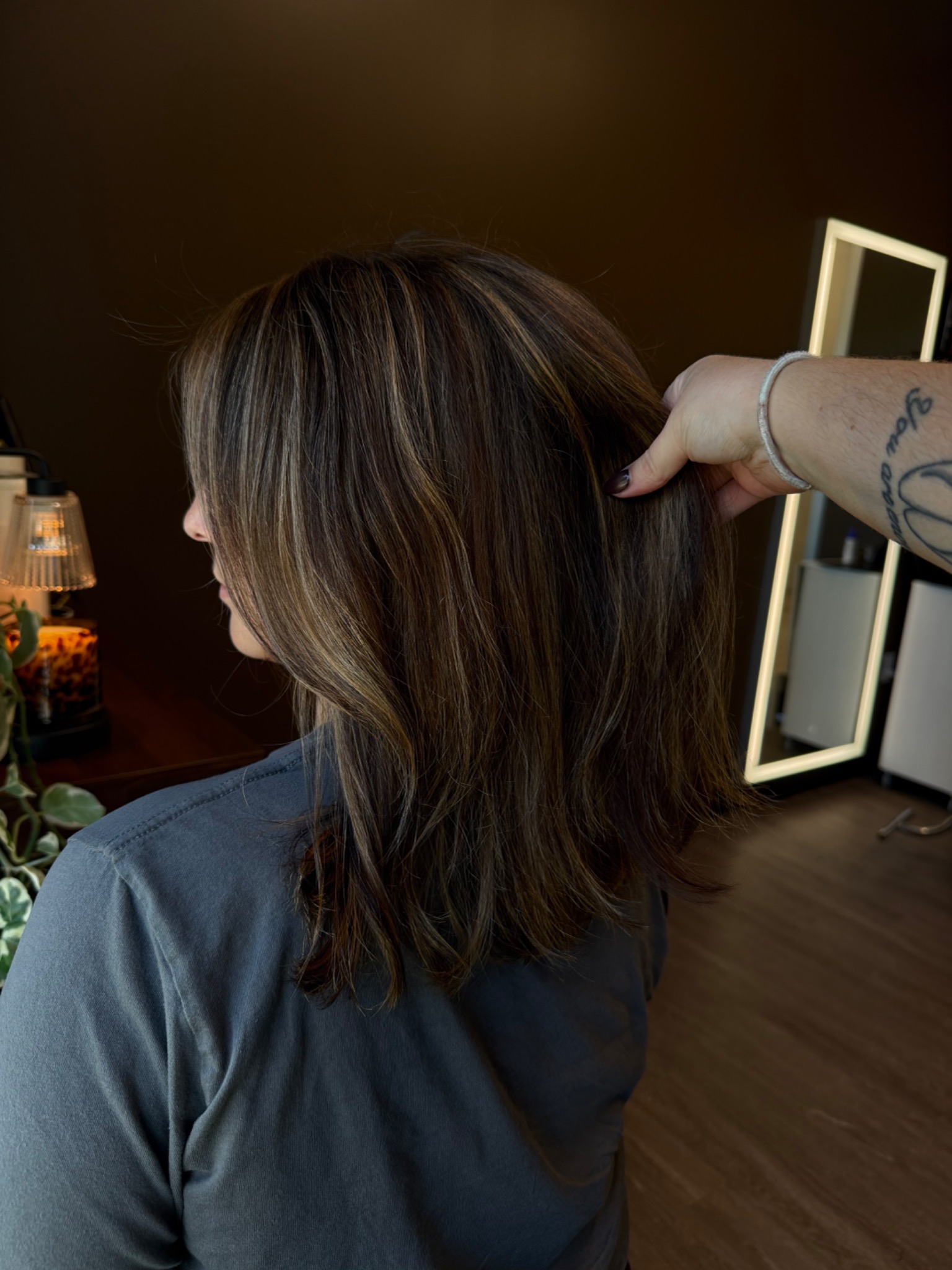 Dimensional brunette shoulder-length color by Hair by Maddie Rose