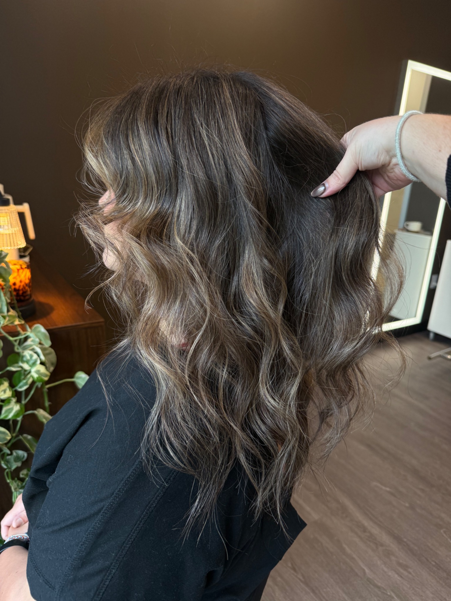 Dimensional brunette with soft ribbons of light by Hair by Maddie Rose