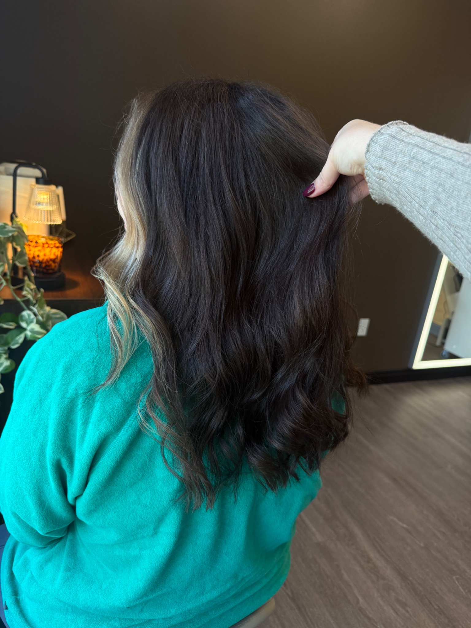 Rich brunette color with a bright face frame by Hair by Maddie Rose