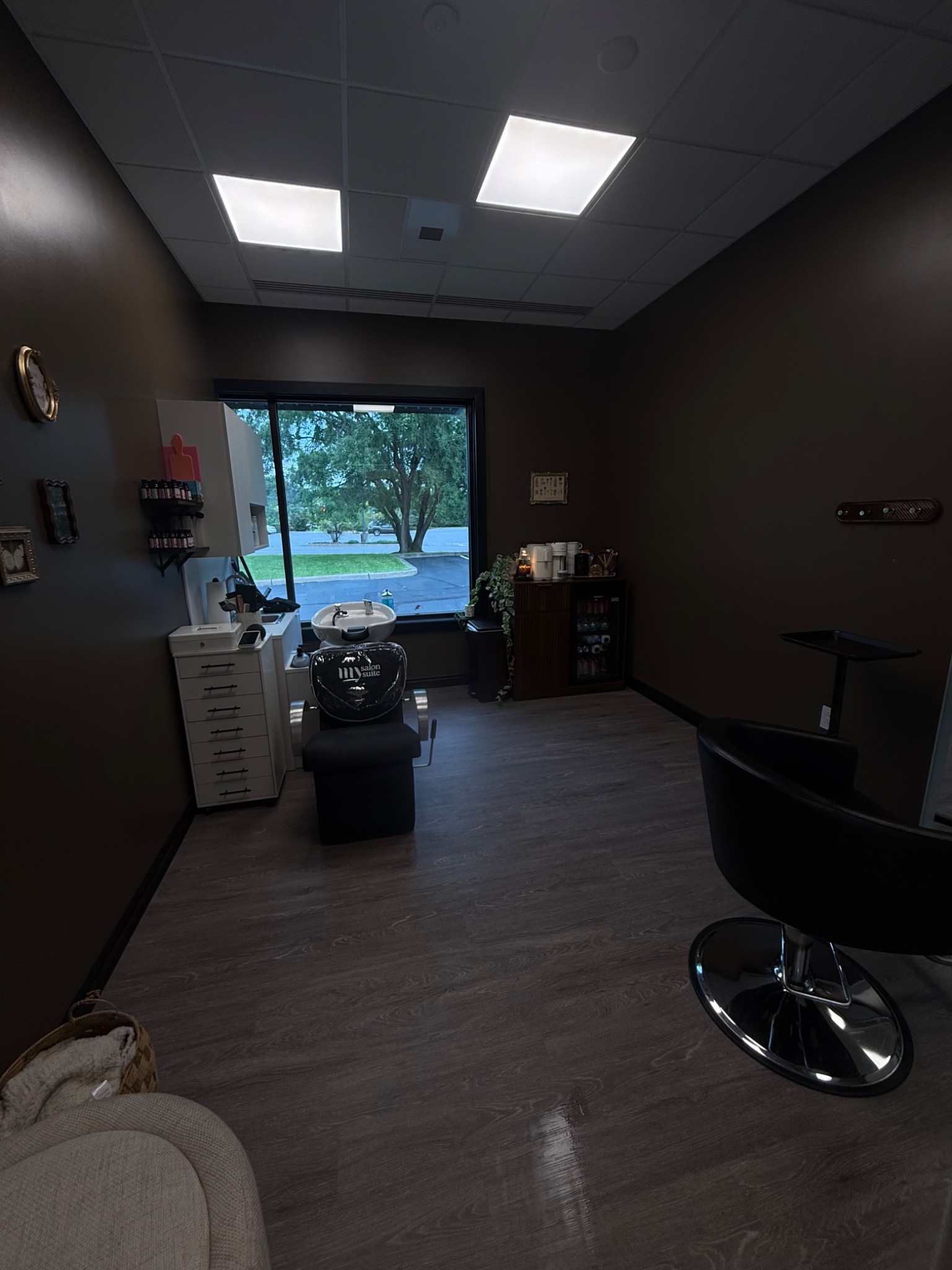Cozy private styling and shampoo area inside Hair by Maddie Rose studio
